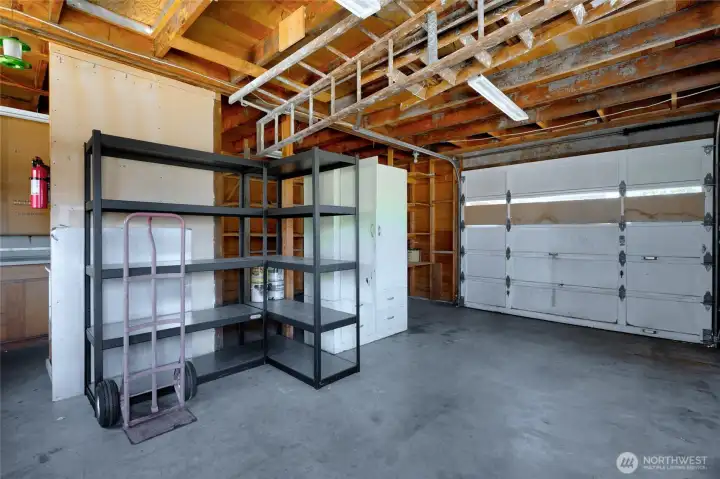 Inside view of the shop with garage door.