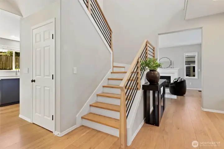 New LVP flooring throughout main floor + stairs and custom stair hand rail New LVP flooring throughout main floor + stairs and custom stair hand rail