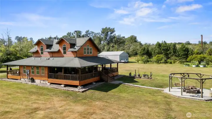 Amazing home with huge front and back deck and your own private outdoor gathering area featured with a timber pergola, built in swings, and fire pit! Amazing home with huge front and back deck and your own private outdoor gathering area featured with a timber pergola, built in swings, and fire pit!