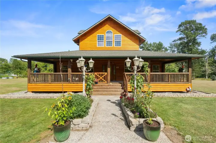 Home features log style siding but is not a log home. Home features log style siding but is not a log home.