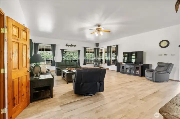 Open and inviting great room offers pellet stove and gas fireplace for cold winter nights. Open and inviting great room offers pellet stove and gas fireplace for cold winter nights.