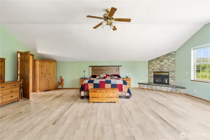 Beautiful gas fireplace and plenty of natural light from all the windows throughout the room. Beautiful gas fireplace and plenty of natural light from all the windows throughout the room.
