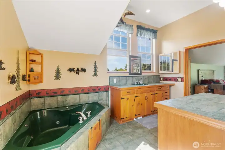 Jetted soaker tub in your oversized primary bathroom. Jetted soaker tub in your oversized primary bathroom.