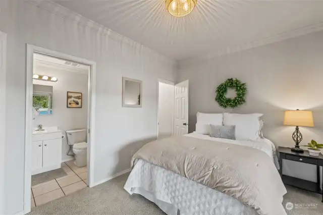 Photo of one of the identical 2 En-Suites on the lower level. Each has a door to the patio outside, a walk-in closet and full bath