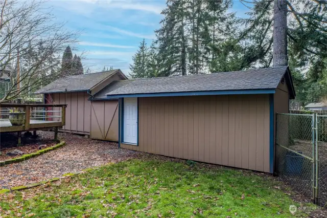 3 outbuildings: woodworking shed, lawnmower shed storage and gym.