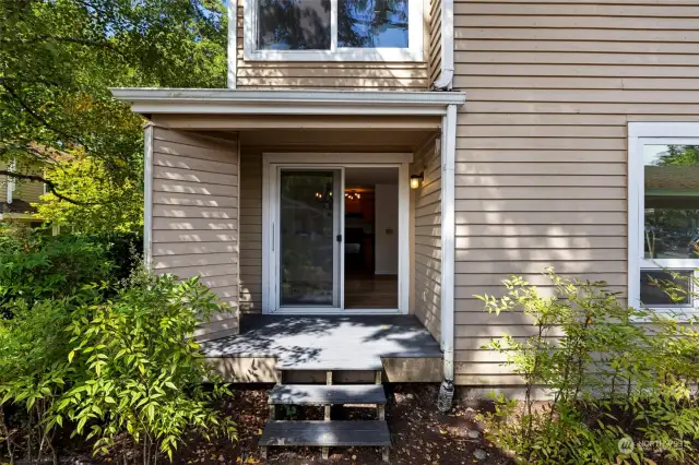 The covered patio is perfect for grilling and entertaining, with a grassy area nearby that’s ideal for relaxing or gathering with friends and family.