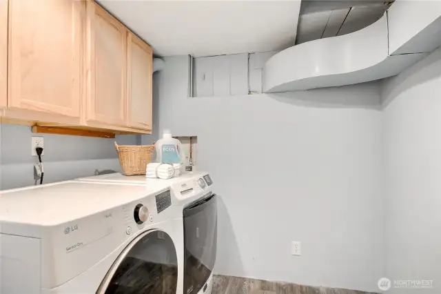 Laundry with added cabinets.