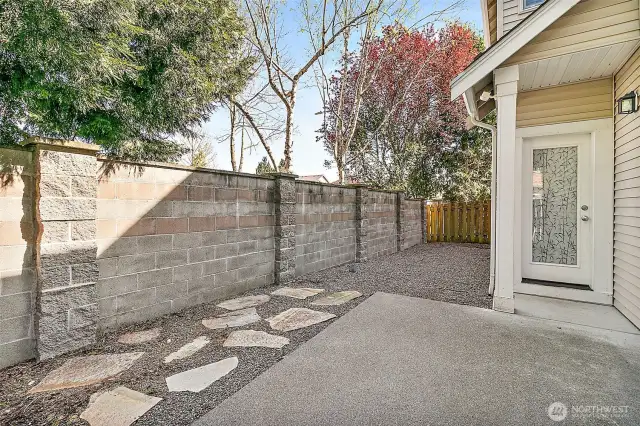 Private fully-fenced side yard with patio. Perfect for your fur babies!
