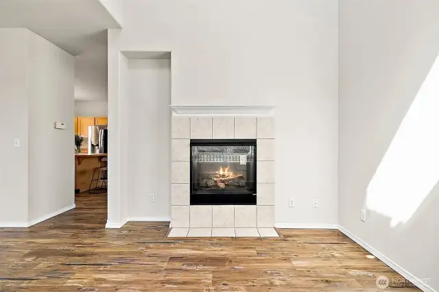 Double-sided gas fireplace on main to keep you cozy!