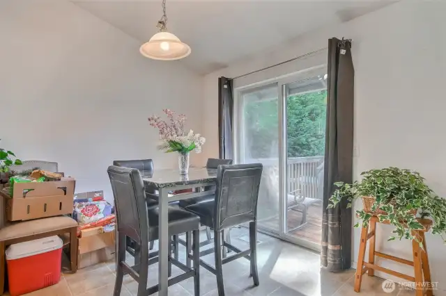 Eating area off kitchen, leads to deck
