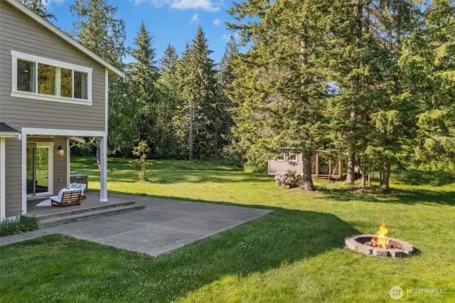 Extensive surrounding patios & firepit