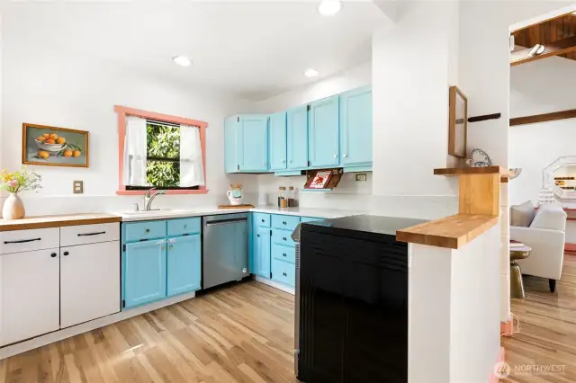 Another look at the cute kitchen and the new KitchenAid 360 with third rack and extra-large capacity, full stainless steel w/PrintShield dishwasher (2023).