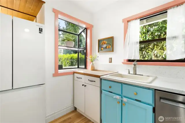 One last look at the kitchen showing the garden window and French door fridge.