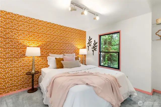 The first of two main-level bedrooms. Bright and cheery!