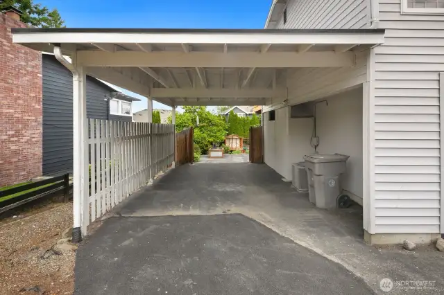 From the carport with storage bring all your toys into the backyard