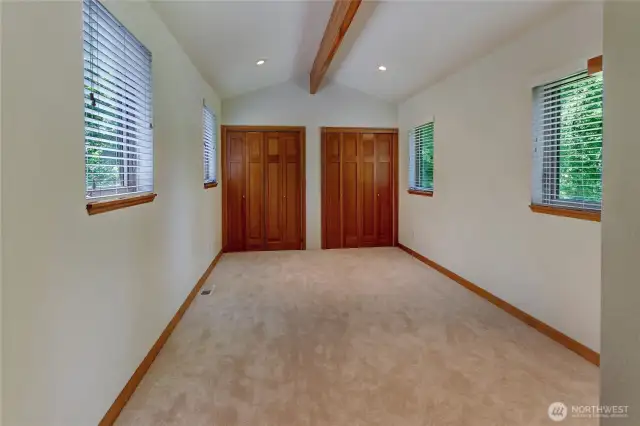 1 of the 2 bedrooms located upstairs.