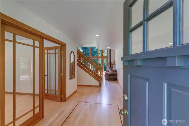 Front entry welcomes you to refinished hardwood floors.