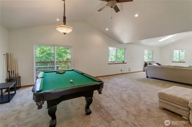 Living space (ADU) above the barn. Slider leads to a deck with territorial views.