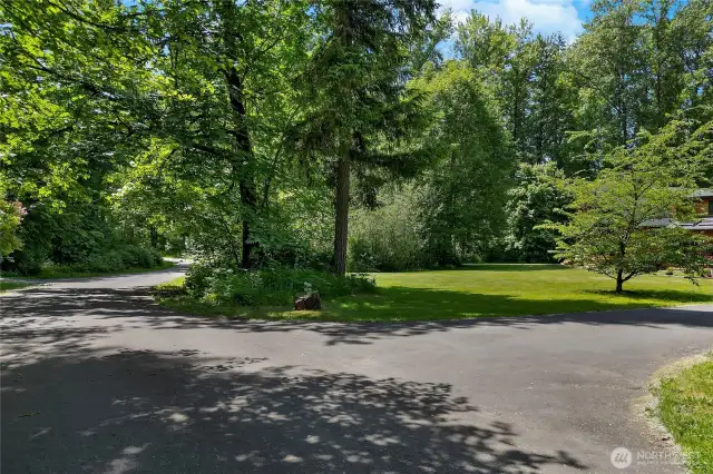 View of first driveway entrance. Driveway is on the right.
