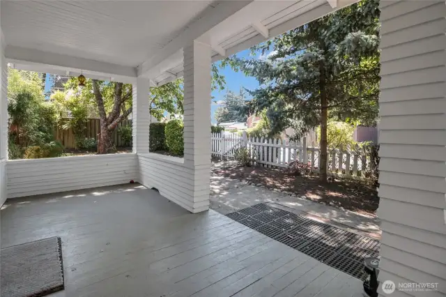 Large covered front porch. There's even a wooden swing!