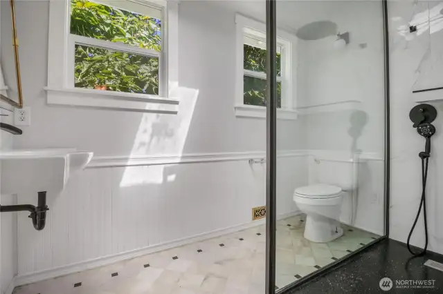 The upstairs bathroom is shared by the two bedrooms.