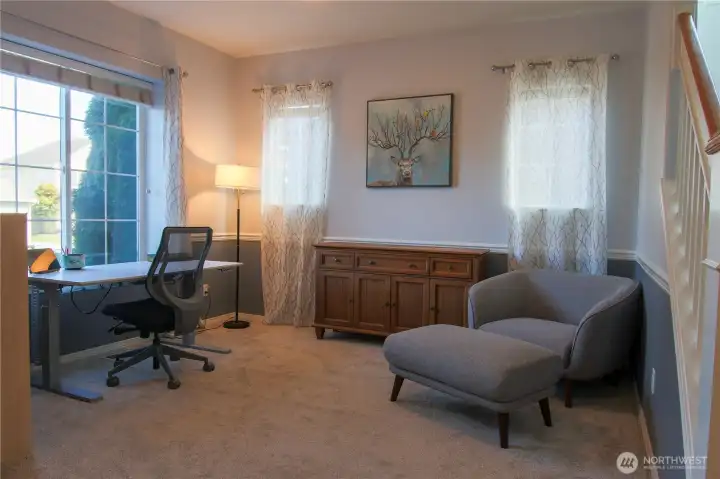 Light and bright office/front living room.