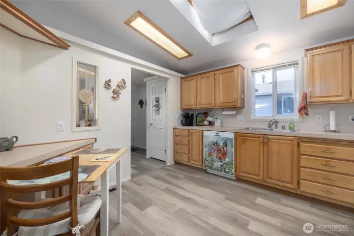 Eat-in kitchen, looking toward the entry.