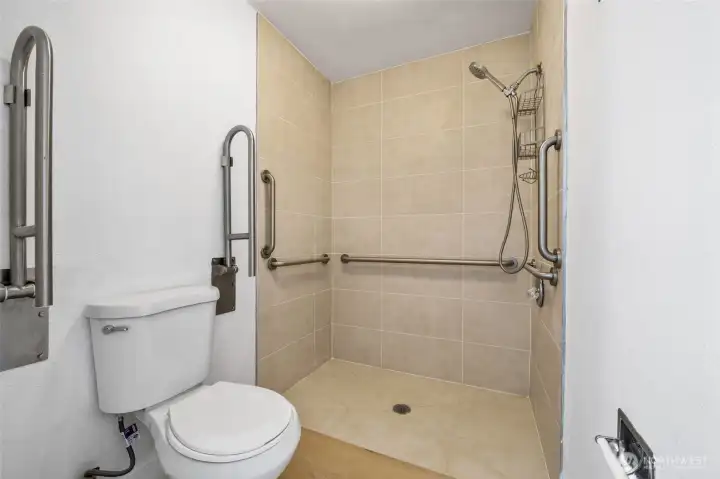 3/4 bathroom with barrier free shower for easy accessibility.
