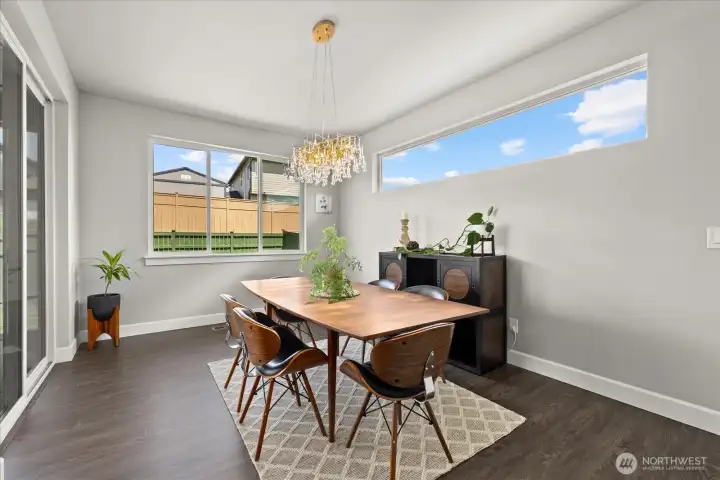 Dining area flooded with natural light.