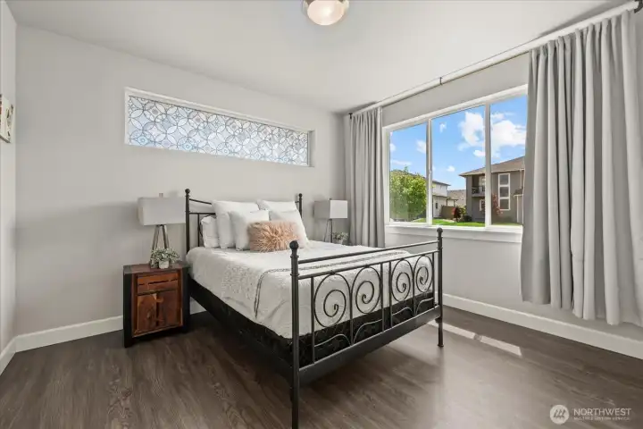 Second primary bedroom, or a spacious & bright office.