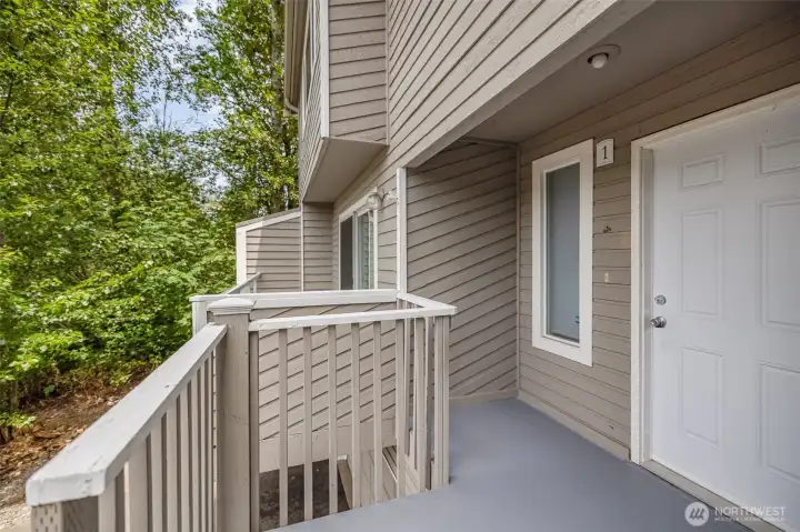 Inviting cozy front patio welcomes you in.