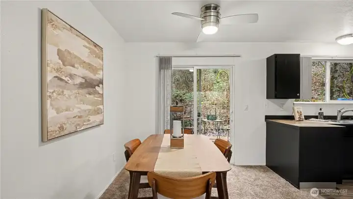 Delightful dining area with sliding door to secluded deck.