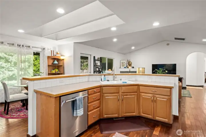 Kitchen looks out to greatroom and backyard.