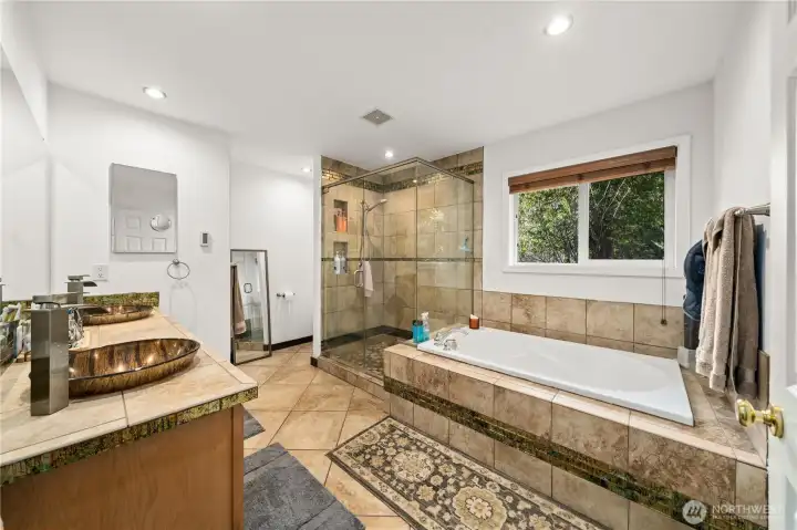 Large primary en-suite with soaking tub and walk-in shower!