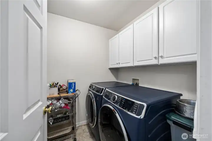 Laundry room right off primary bedroom.