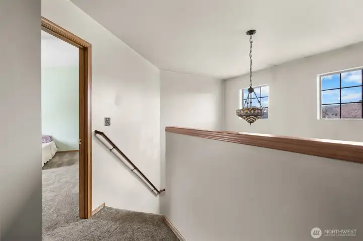 Natural light fills the upper landing