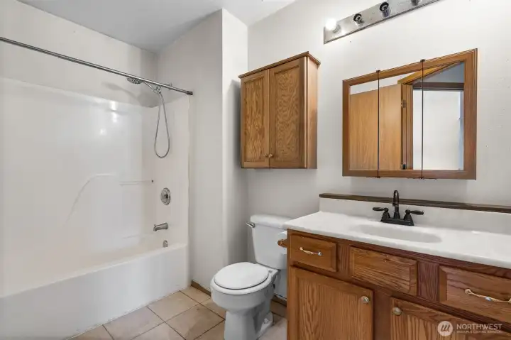 A full bathroom conveniently located near the secondary bedrooms