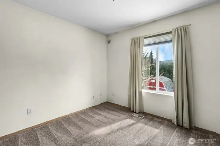 Perfect for guests, a home office, or a hobby space, this third bedroom offers versatility