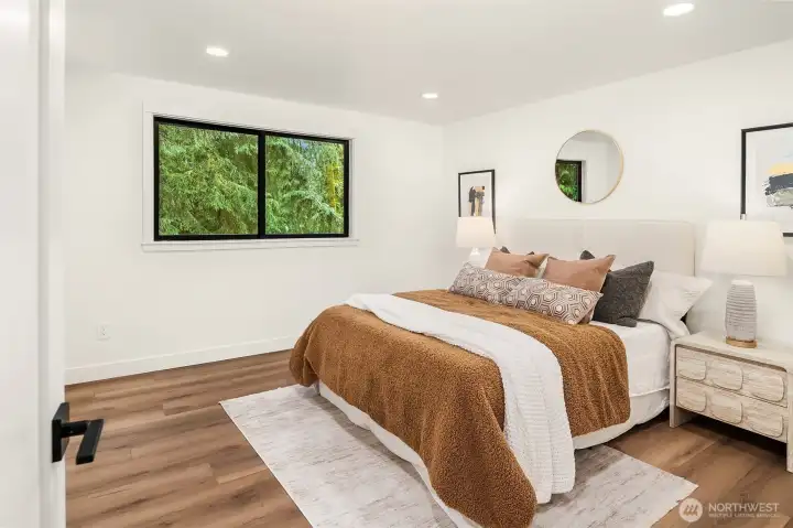 Primary with ensuite and walk-in closet.