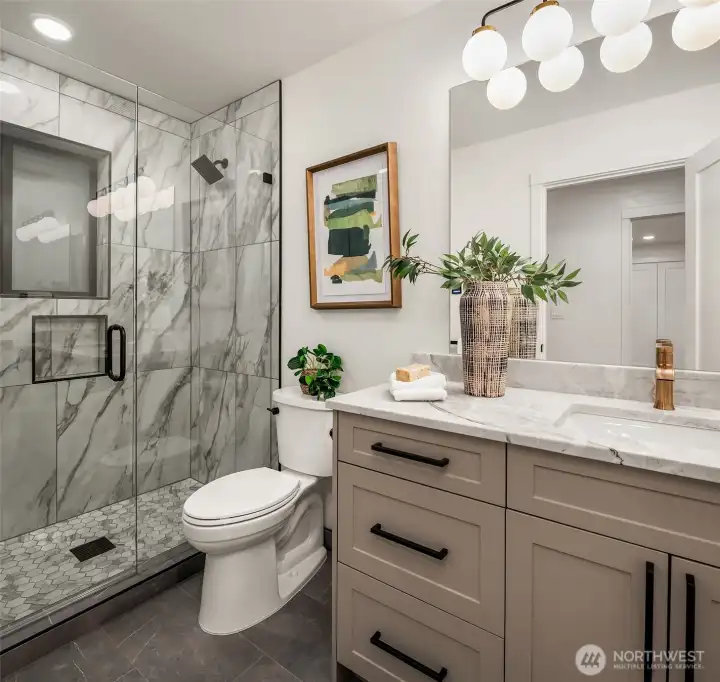 Additional bath on lower level serves 4th bed- makes a fantastic guest suite!