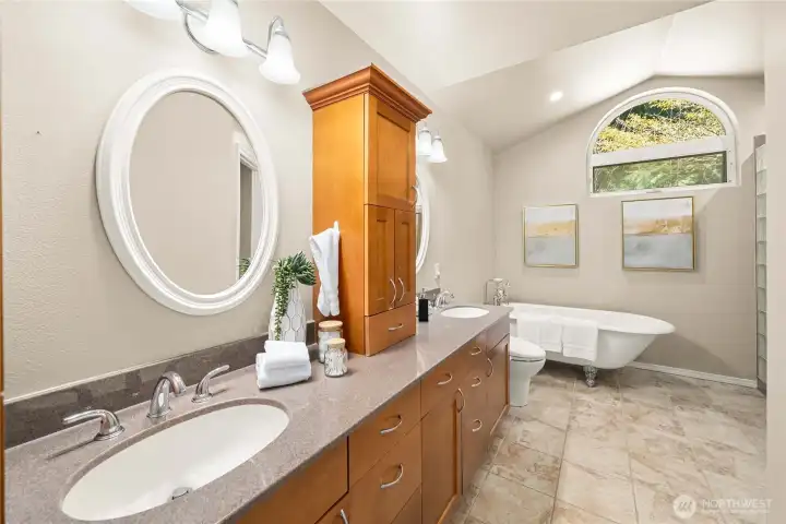 Spa-like en-suite bath with modern updates.