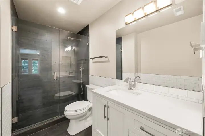 Fully remodeled lower bath with heated floors.