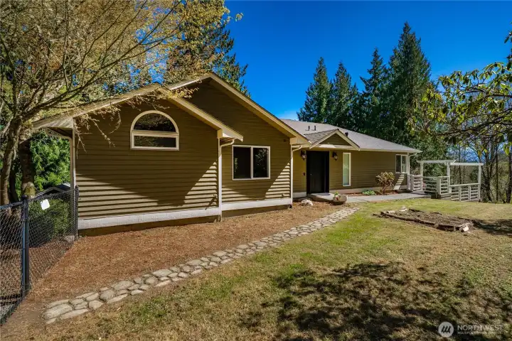 Front exterior. Privacy and tranquility from the moment you arrive.