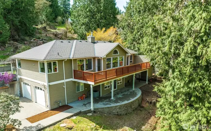 Ariel view of back exterior of the home. Versatile outdoor spaces. Ariel view of back exterior of the home. Versatile outdoor spaces.