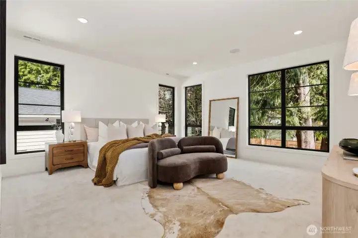Large Private Primary Suite with Seating Area, In-Ceiling Speakers and Oversized Custom Windows