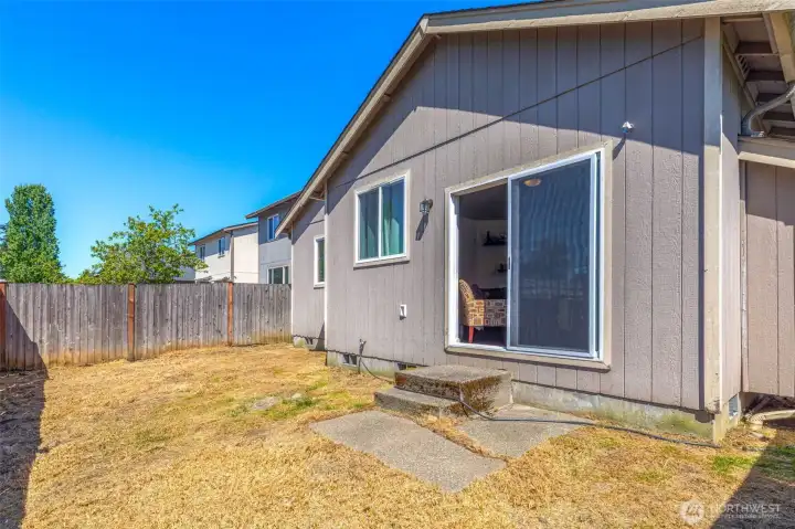 Low-maintenance fenced backyard