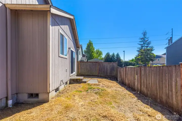 Low-maintenance fenced backyard