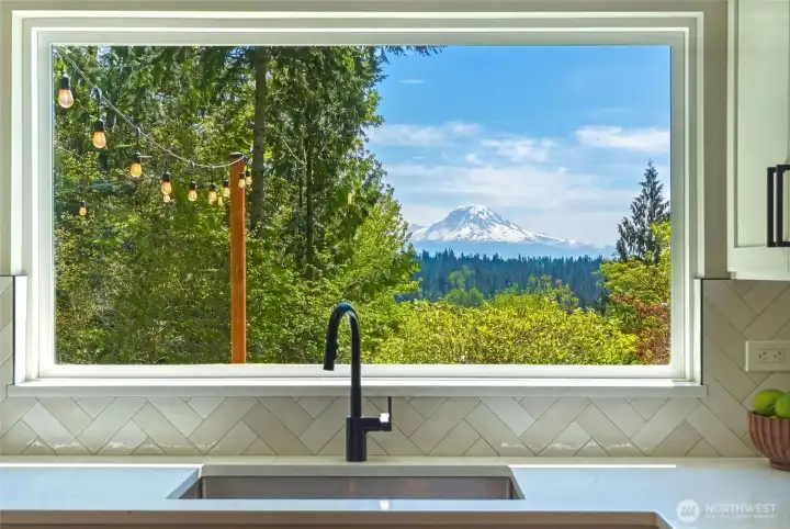 Stunning kitchen window framing Mt. Rainier views, bringing natural beauty directly into the home.