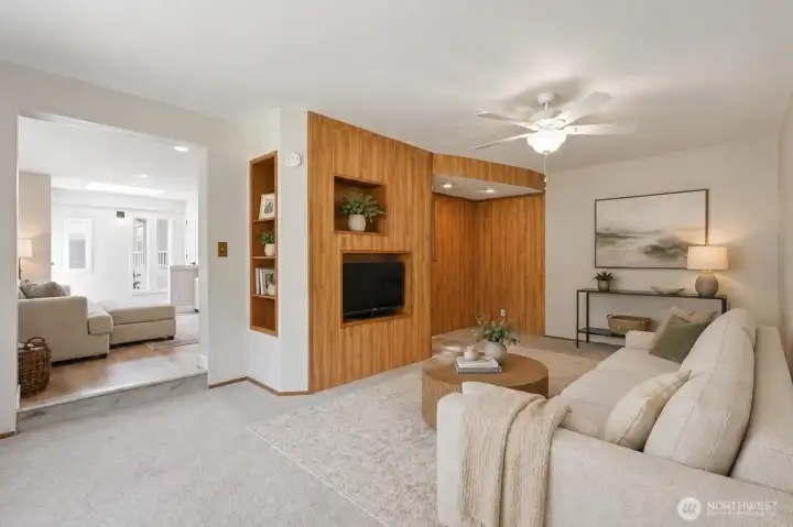 Freshly staged living room with neutral tones, modern furniture, and warm wood accents creating inviting ambiance.