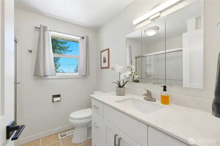 Updated bathroom with clean finishes, modern vanity, and functional layout for everyday convenience.